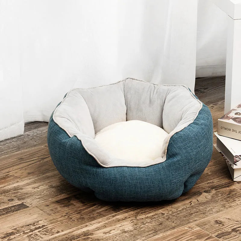 Blue octagonal pet bed with removable mat for a small dog or cat.