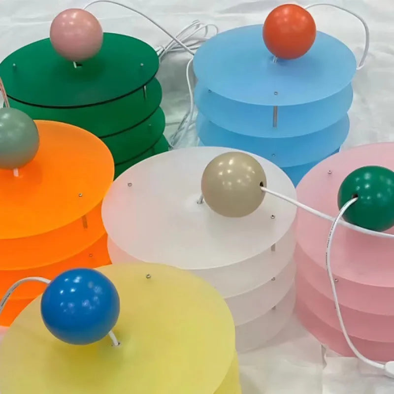 Modern Macaron PH5 adjustable chandelier with frosted glass shade in choice of white, blue, or orange.