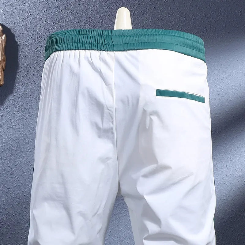 Ice silk breathable stretch slim-fit ankle-tied skinny sports trousers for men, black stripe design