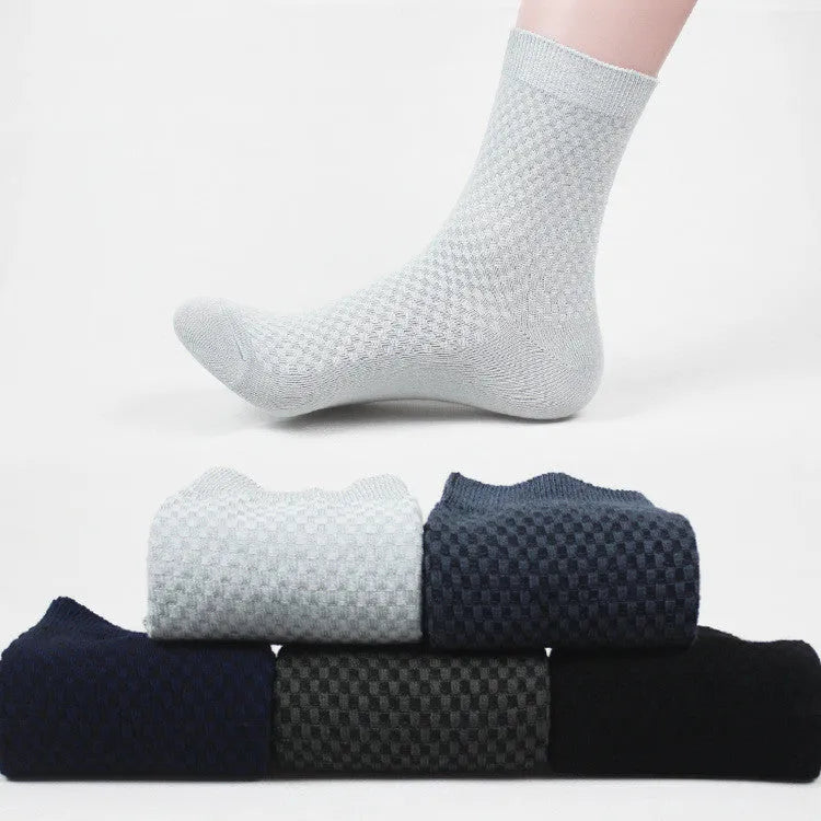 Men's bamboo fibre sock in small square pattern, shown in navy blue colour
