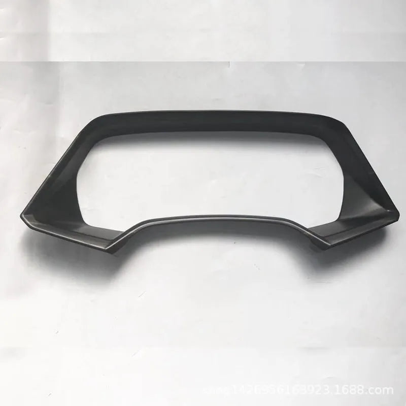 BMW X5L dashboard decorative frame in carbon fibre and peach wood finishes