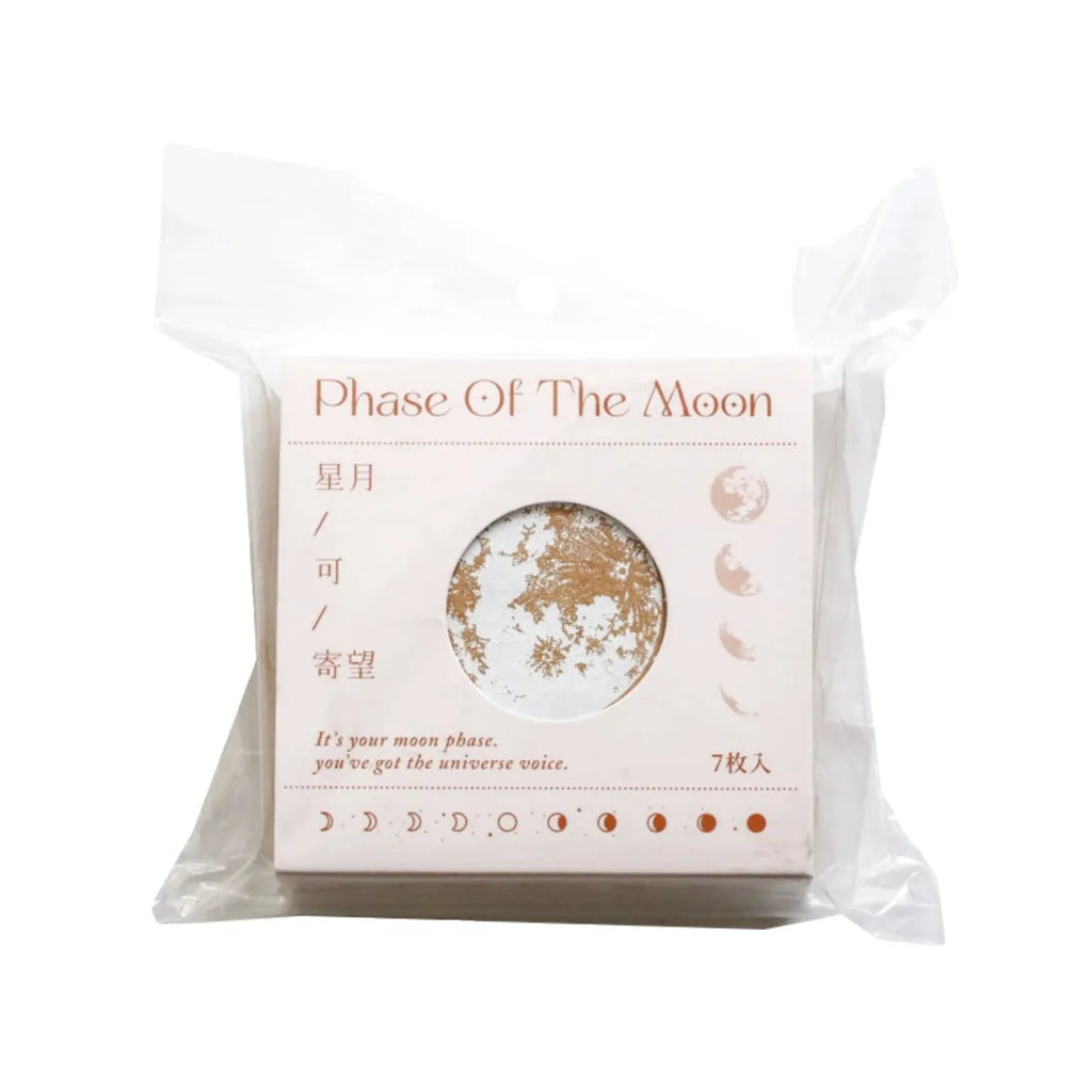Wooden decorative stamp set with seven hand-carved botanical or celestial designs for paper crafts