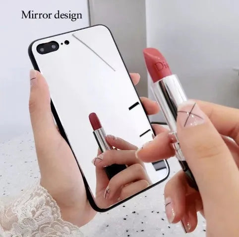 Black iPhone mirror phone case showing reflective surface on back, compatible with iPhone X and other models.