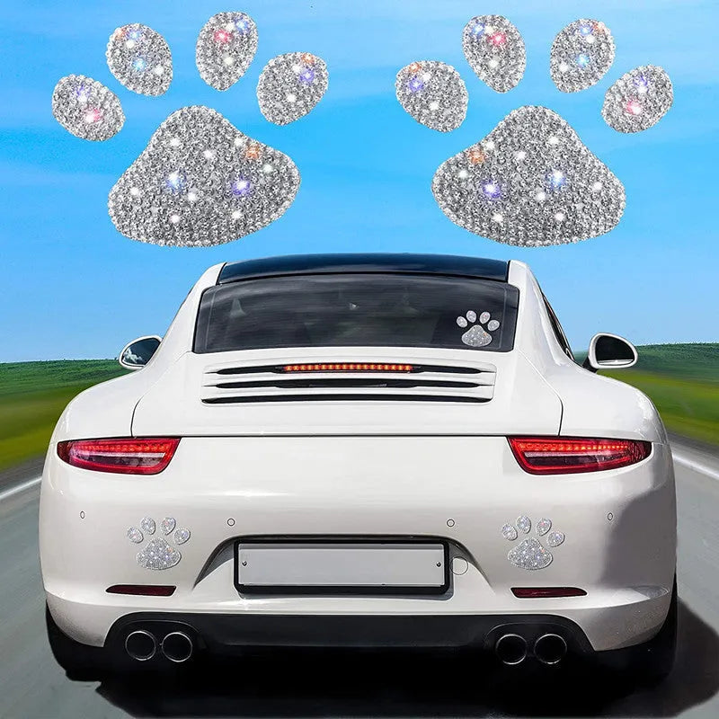 Glass car sticker with diamond-encrusted butterfly and bear paw design, 7cm by 6cm.