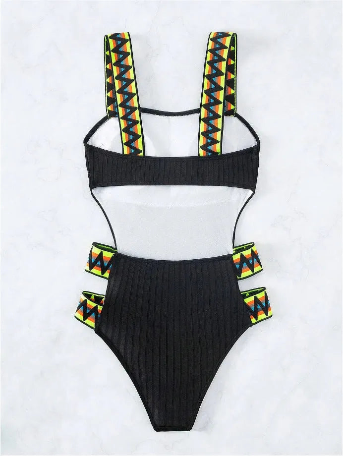 Solid black and orange women's one-piece polyester swimsuit bikini on a white background.