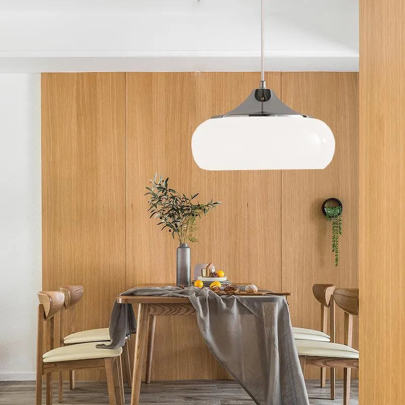 Bauhaus style three-headed pendant light with milk white egg tart glass shades