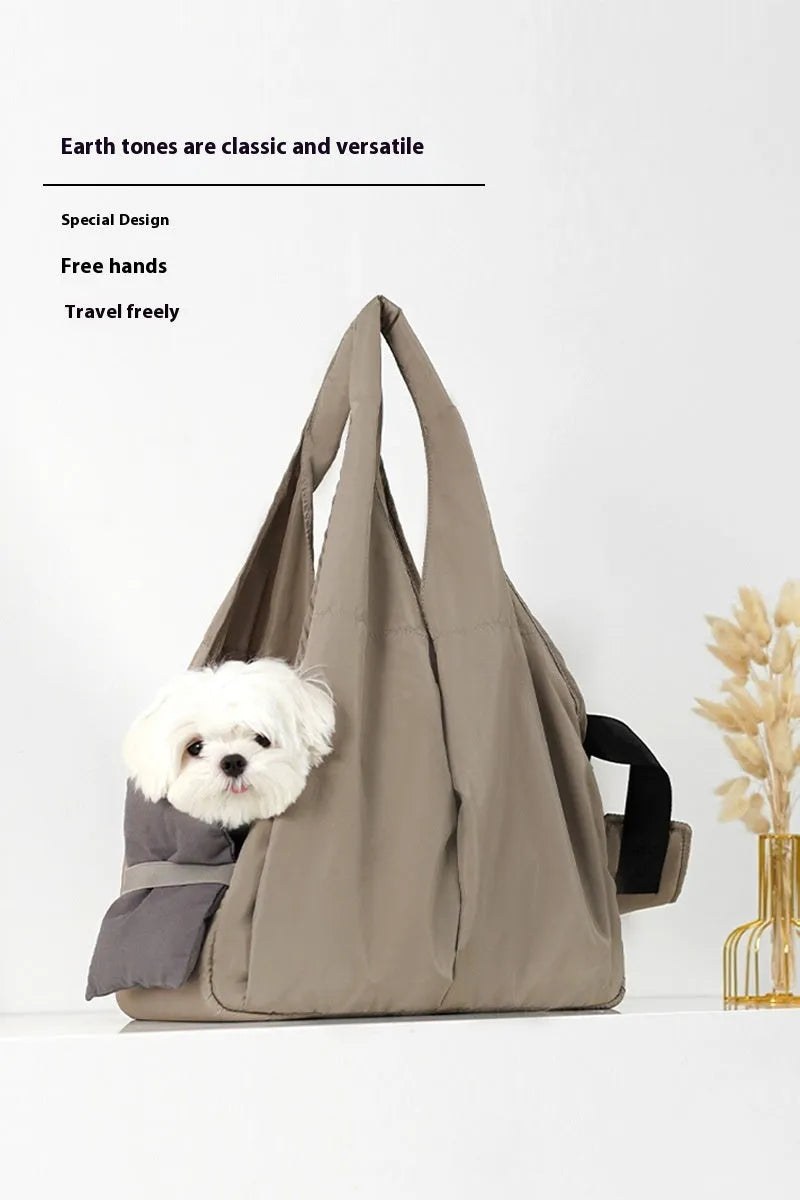 Apricot colour cloth pet carrier handbag with breathable mesh for a cat or small dog.