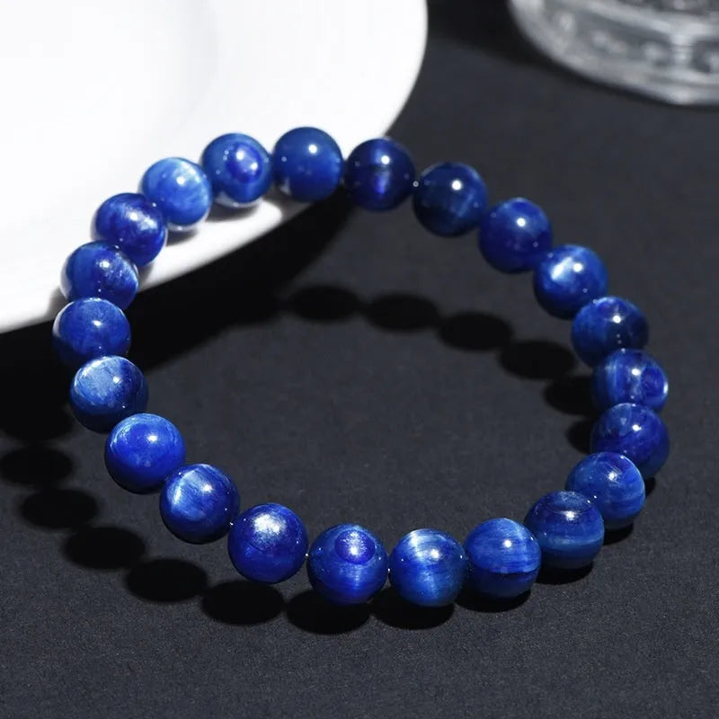Natural blue crystal ball bracelet with geometric design and Ruyi pattern on wrist