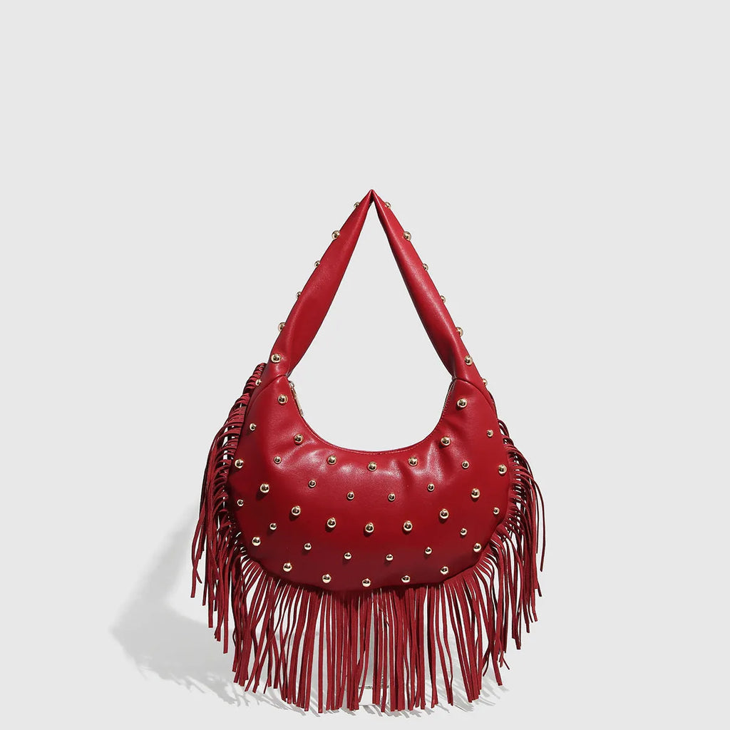 Retro style shoulder handbag with tassel detail in black or wine red colour with internal phone compartment