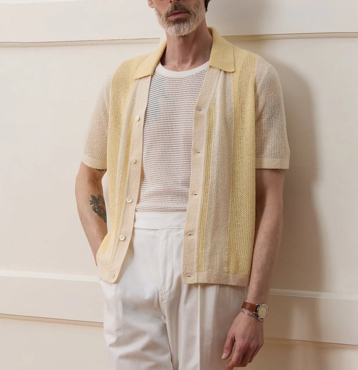 Yellow asymmetrical Tencel polo shirt with hollow-out detailing and short sleeves