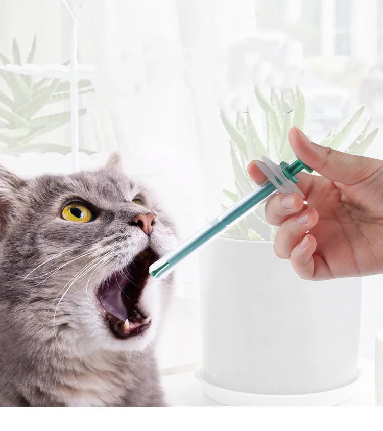 Two pet pill shooters with soft silicone tips for cat and dog medication feeding