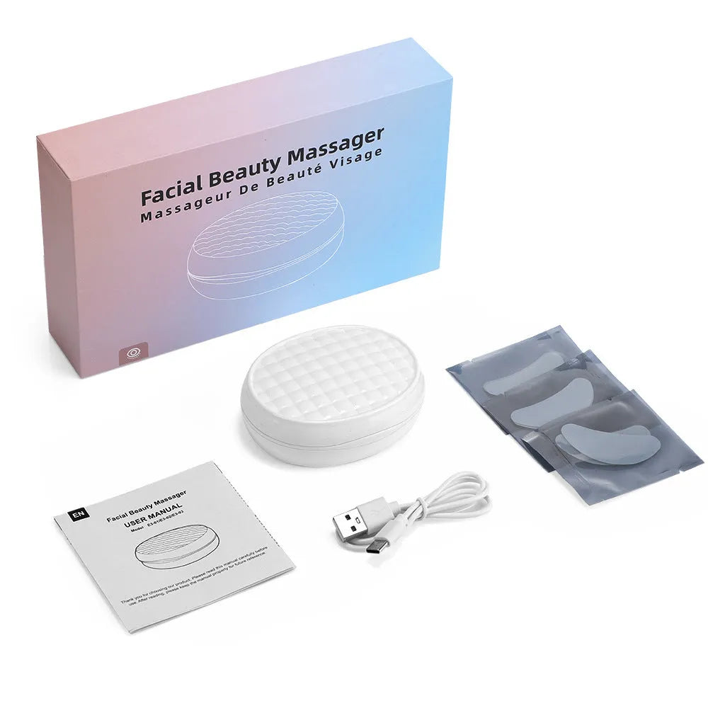 White wireless red light eye and facial massager with EMS therapy function