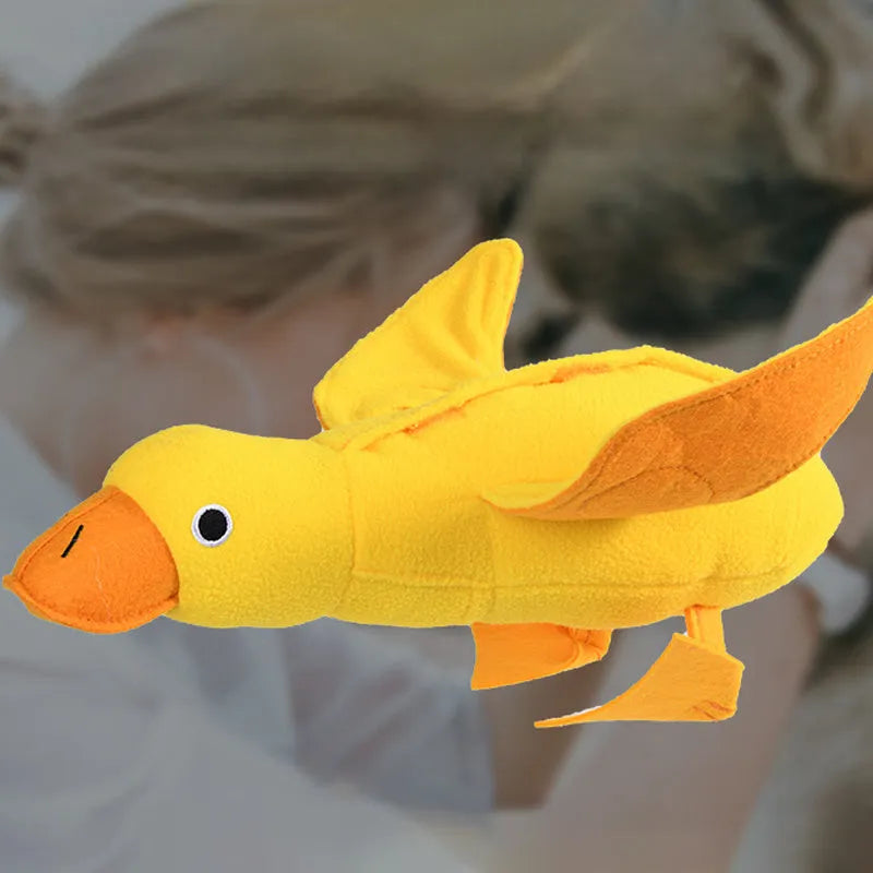 Yellow bone-shaped dog training toy with built-in duck sound chip and treat leakage compartments