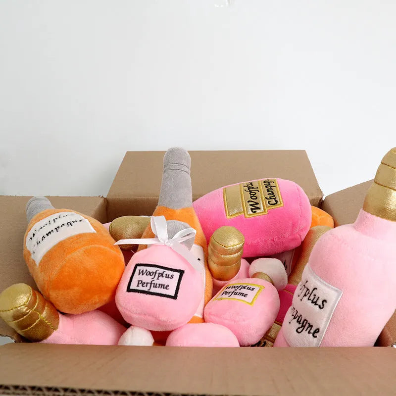 Plush wine bottle pet toy for dogs and cats with squeaker and crinkle sounds in six colour options