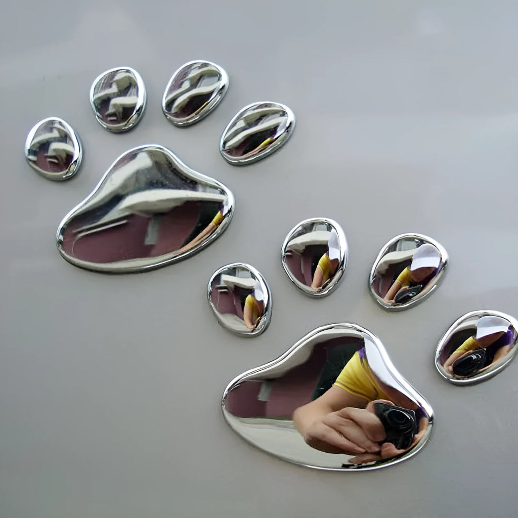 Pair of hand-shaped dog footprint car stickers in four colour options, each 7 cm long.