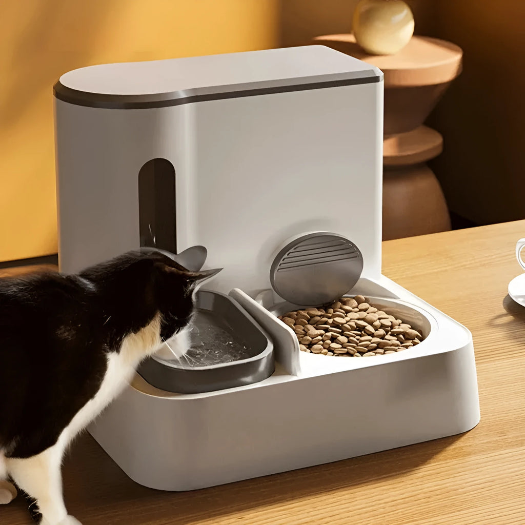 Grey automatic cat feeder with integrated water dispenser and double bowl design