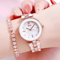 Round white dial ladies quartz watch with stainless steel strap and rose gold accents