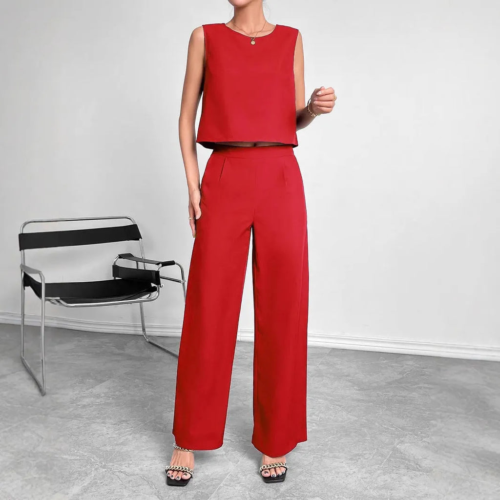 Red sleeveless round neck top with matching wide leg trousers two-piece set