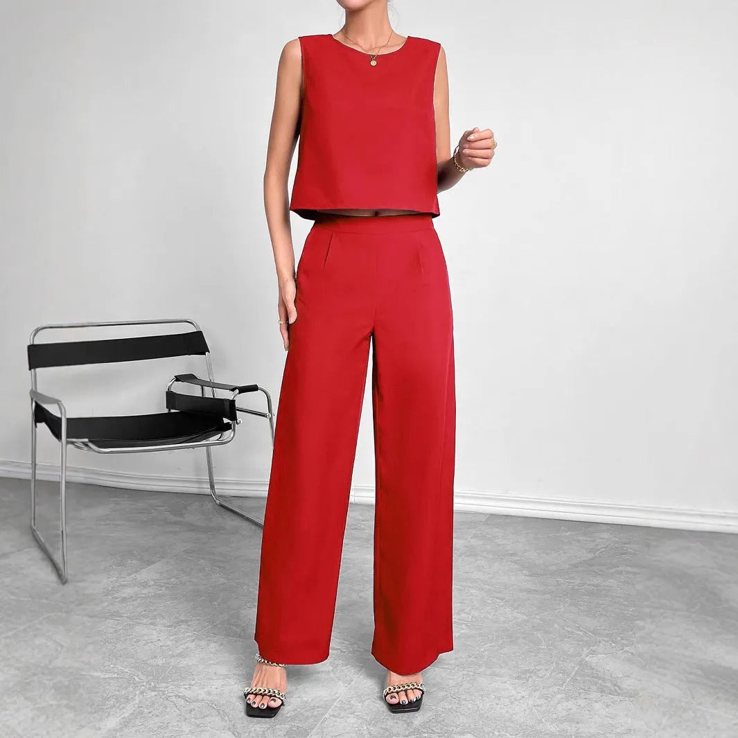 Red sleeveless round neck top with matching wide leg trousers two-piece set