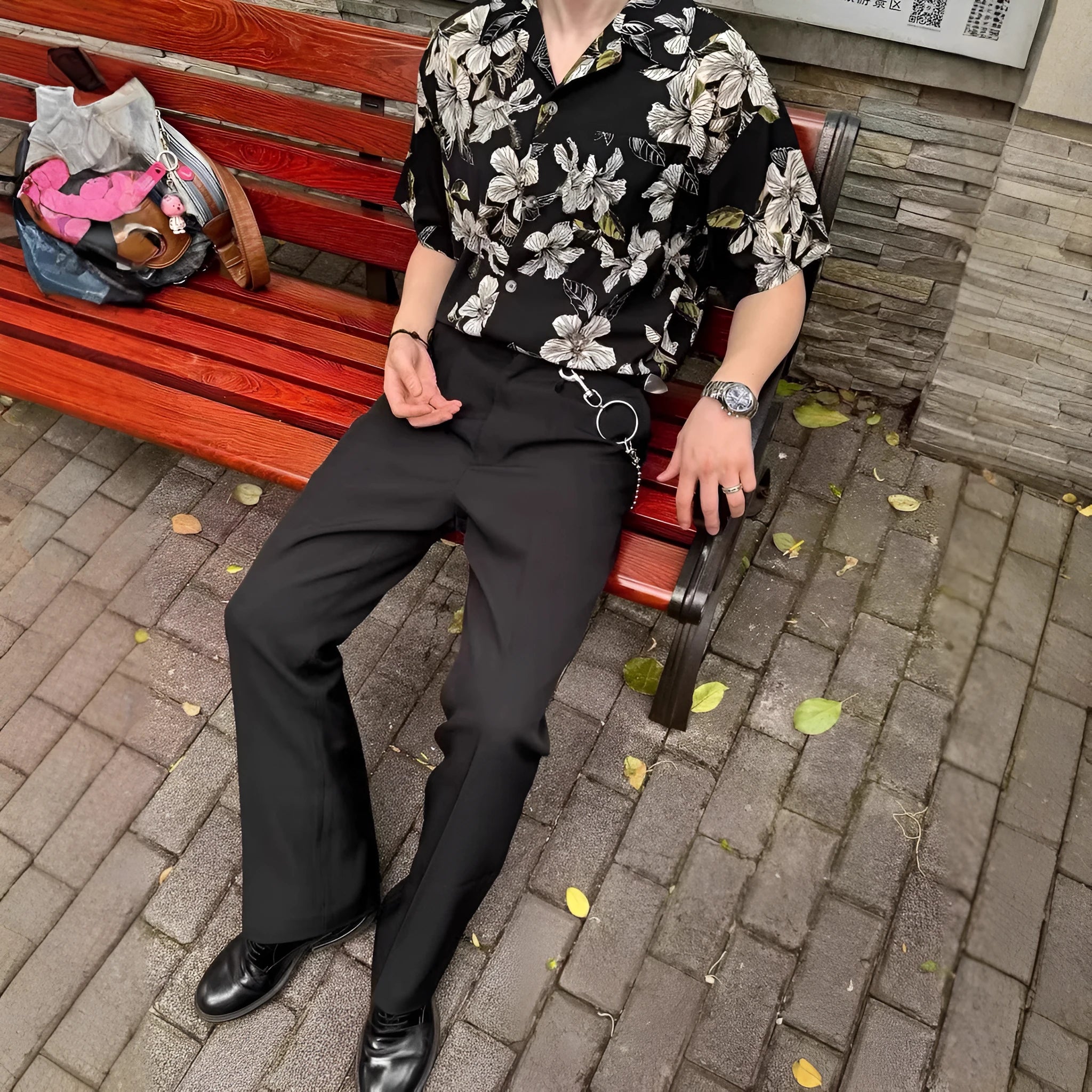 Black men's vintage Cuban collar shirt with floral print, made from thin ice silk fabric for summer.