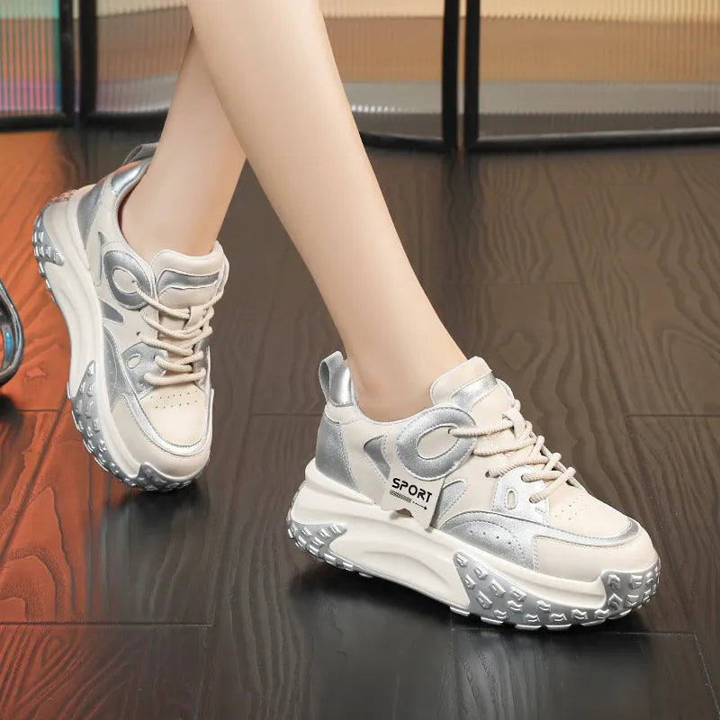 Women's silver leather casual shoes with thick wedge soles and lace-up front.