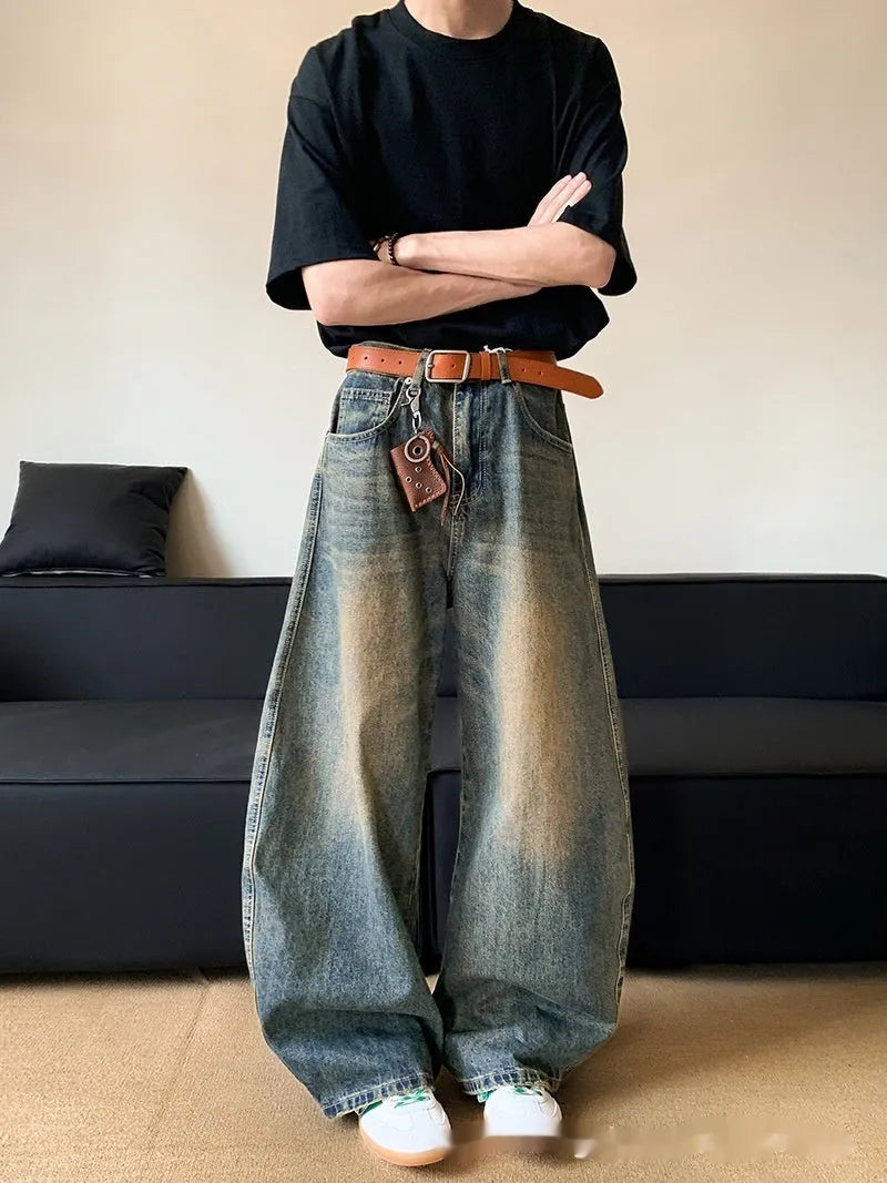 Men's retro blue distressed denim jeans with wide-leg cut and micro elasticity fabric