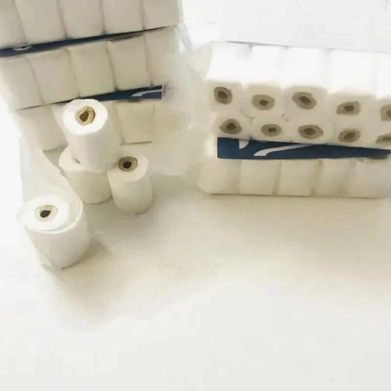 Miniature paper tissue roll model for dollhouse play measuring 30x15x80mm