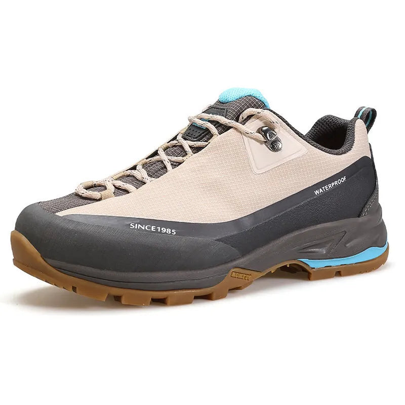 Men's low-top hiking boots in black with leather mesh upper and lace-up front.