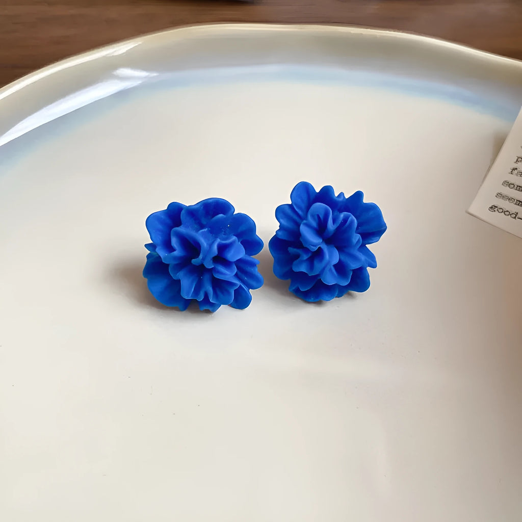 Handcrafted geometric women's earrings with cloth material and silver needle-blue resin flower elements