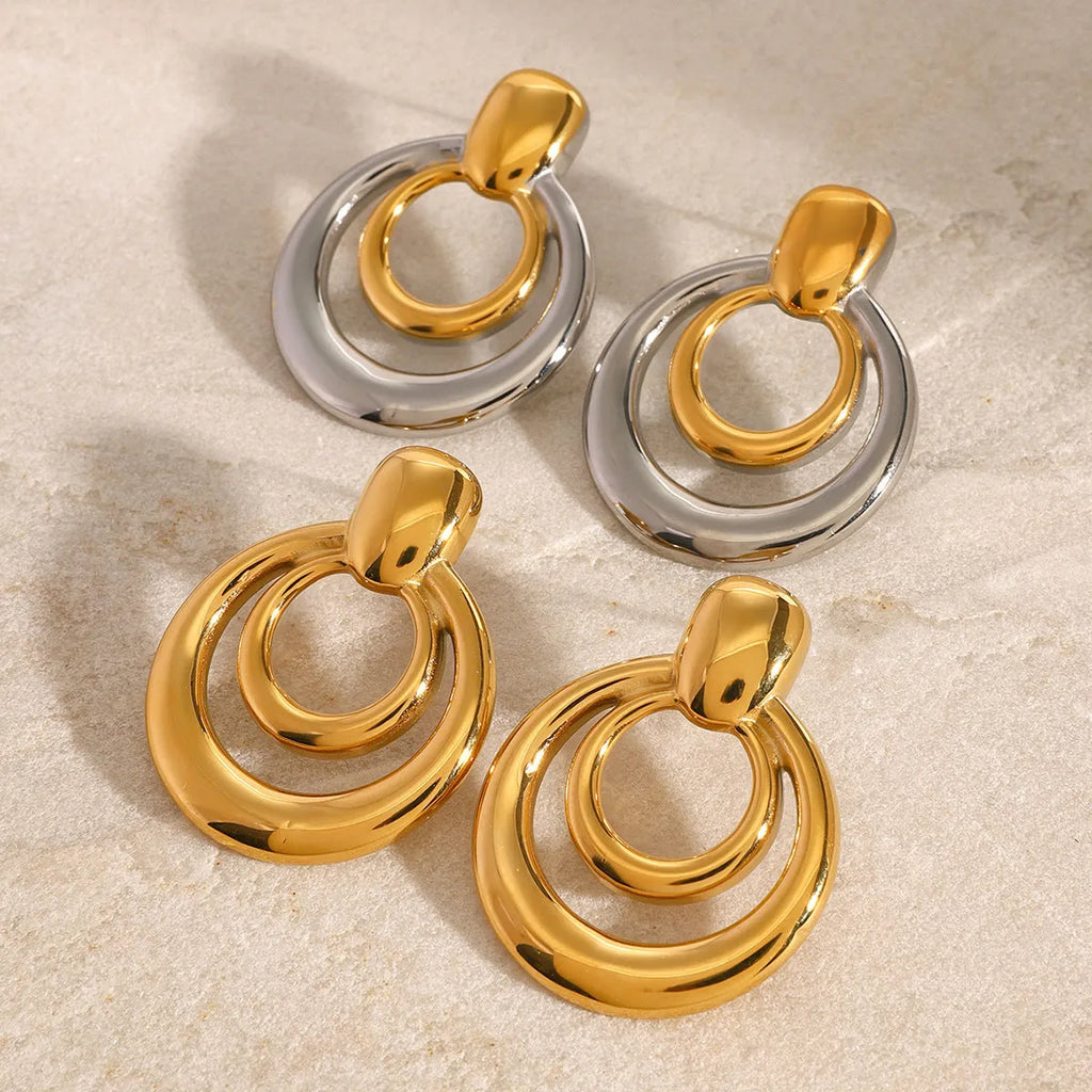 Round geometric gold-plated hollow stud earrings with double layer design on titanium steel