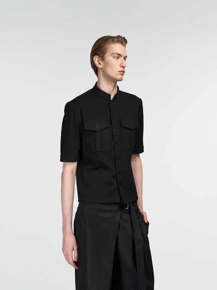 Handmade black half-sleeve hunting shirt with a red eye design detail and shirt collar.