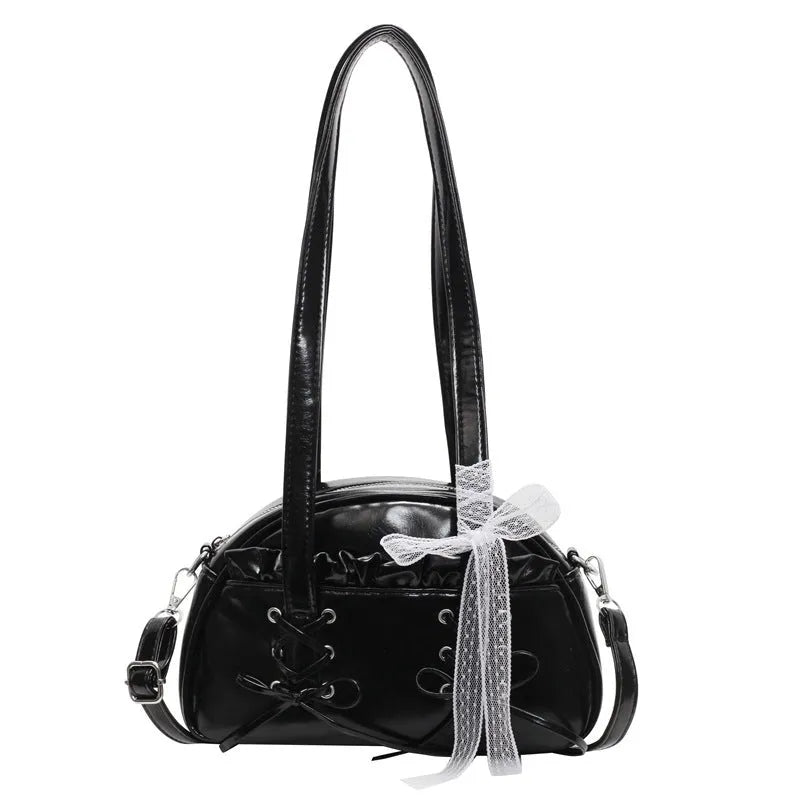 Women's casual PU leather handbag with a bandage bow decoration on the front.
