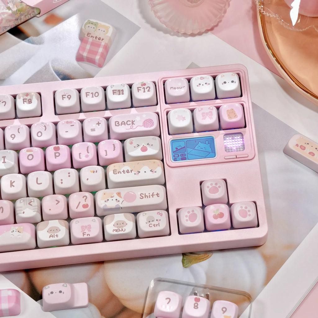 Pink cartoon MOA height plastic keycaps with five-sided sublimation arranged in a full set layout.