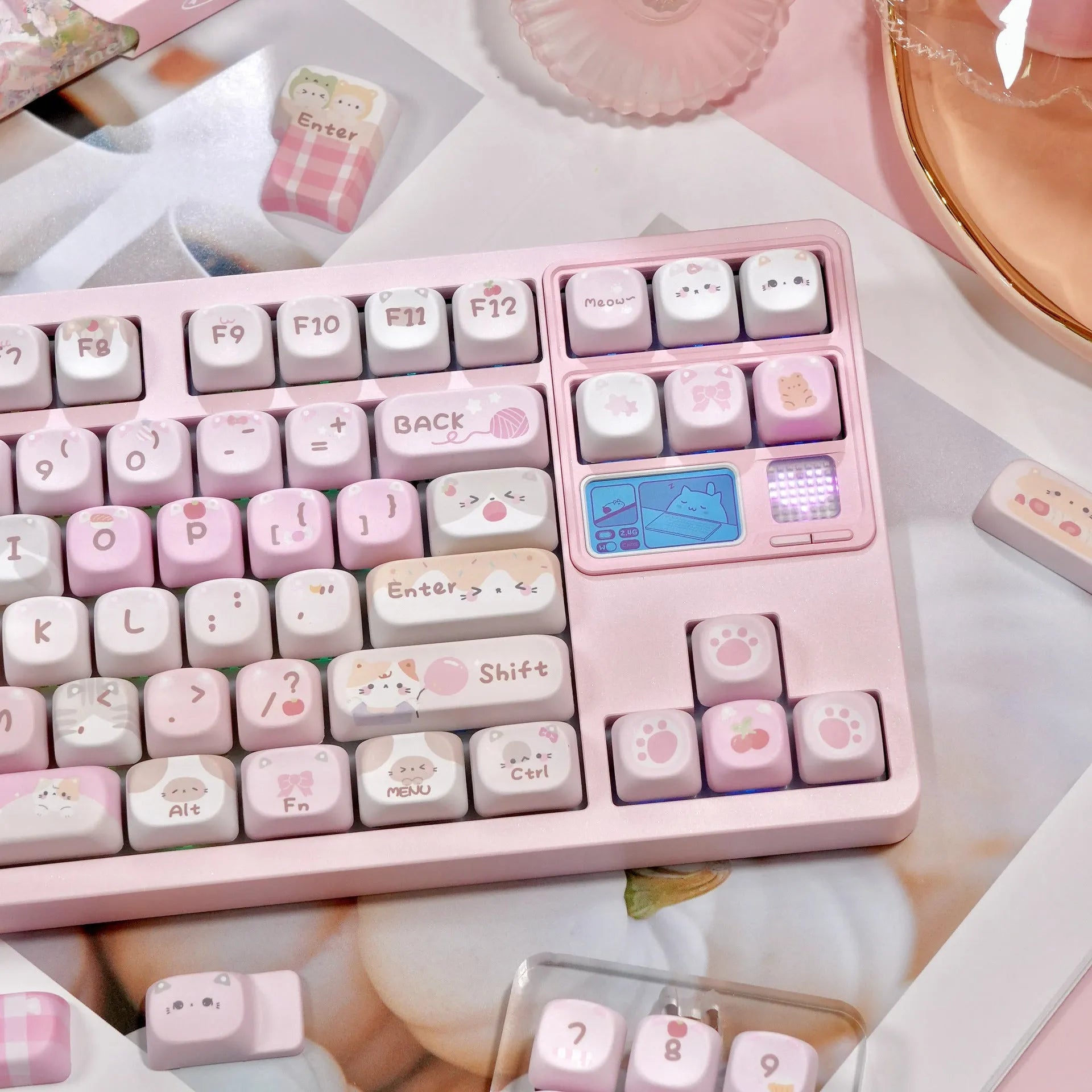 Pink cartoon MOA height plastic keycaps with five-sided sublimation arranged in a full set layout.