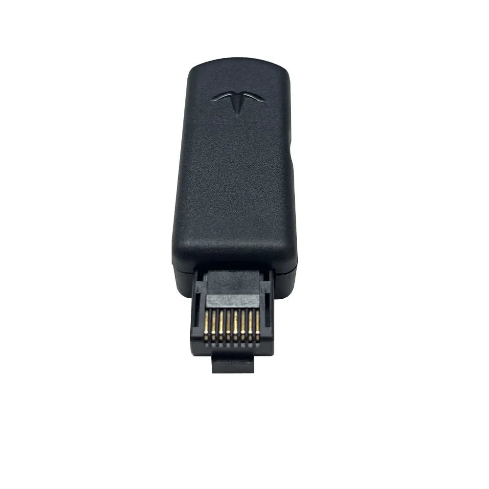Black aluminum alloy JB Tool USB adapter for console firmware switching with Ethernet port.