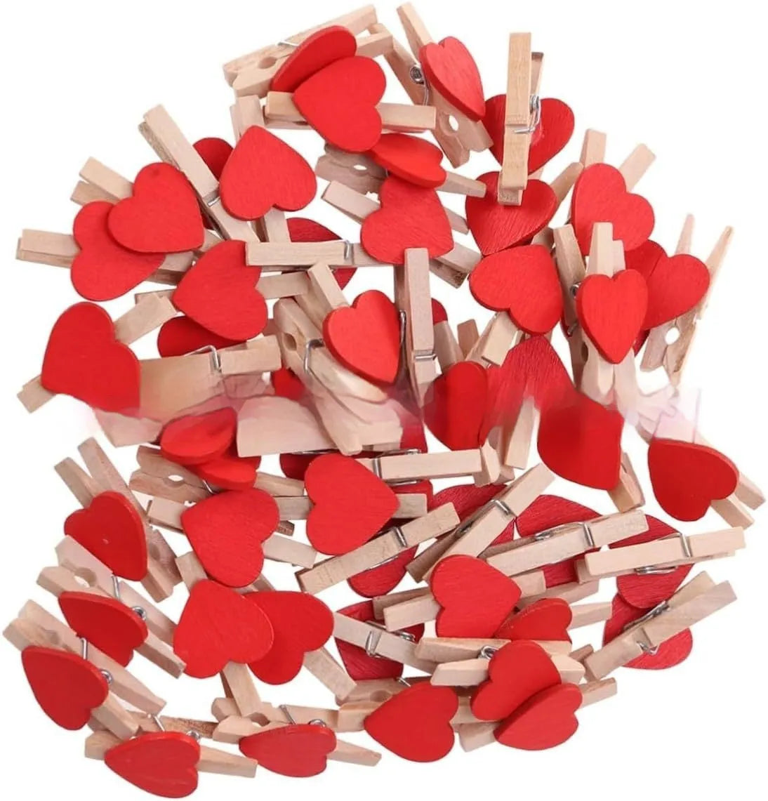 Five wooden heart-shaped hair clips in different colours on white background