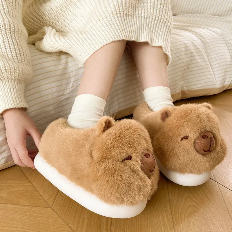 Light brown women's winter slippers with plush upper and cartoon pattern