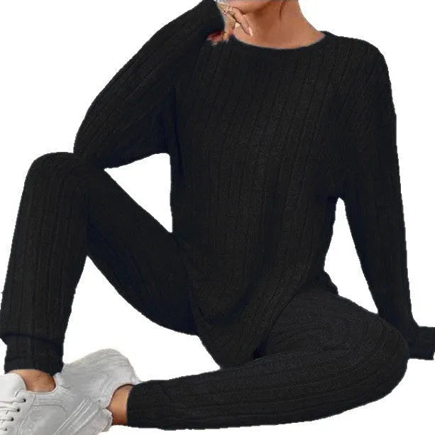 Women's black sunken stripe polyester two-piece homewear set with regular sleeve top and matching trousers