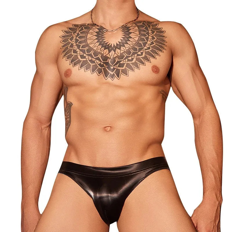 Black and white men's hipster briefs made from shark skin lace polyester fabric.