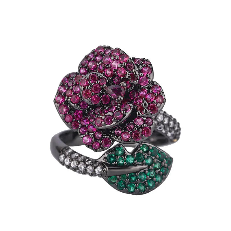 Gold-plated black gold flower personality ring with simulated red corundum stones
