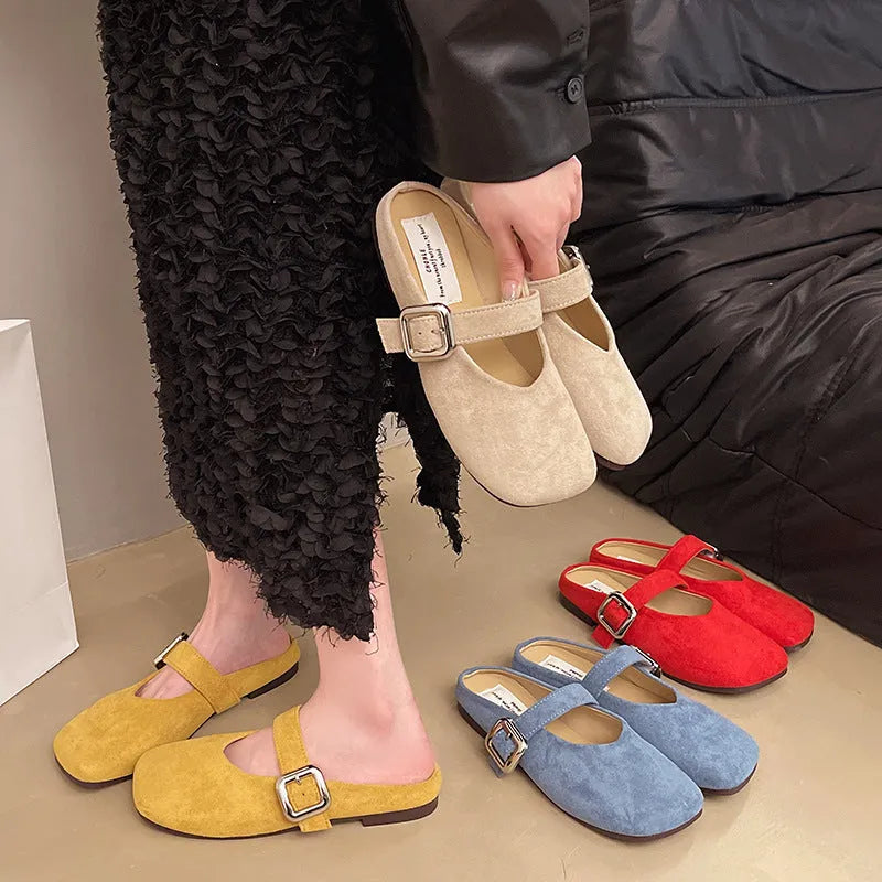 Women's flat square head slippers in apricot colour, showing closed toe and rubber sole.