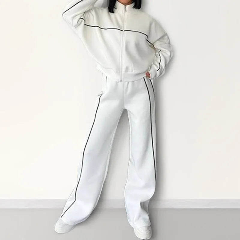 Casual polyester suit with zip hoodie and striped lace-up trousers in apricot colour.