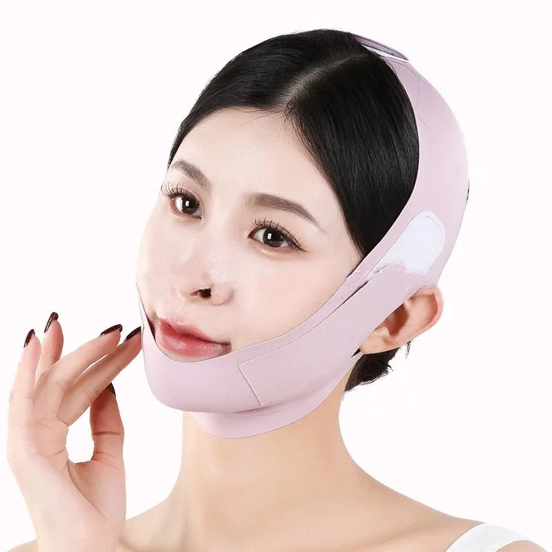 Graphene fabric face shaping mask in purple and green colours for facial contouring