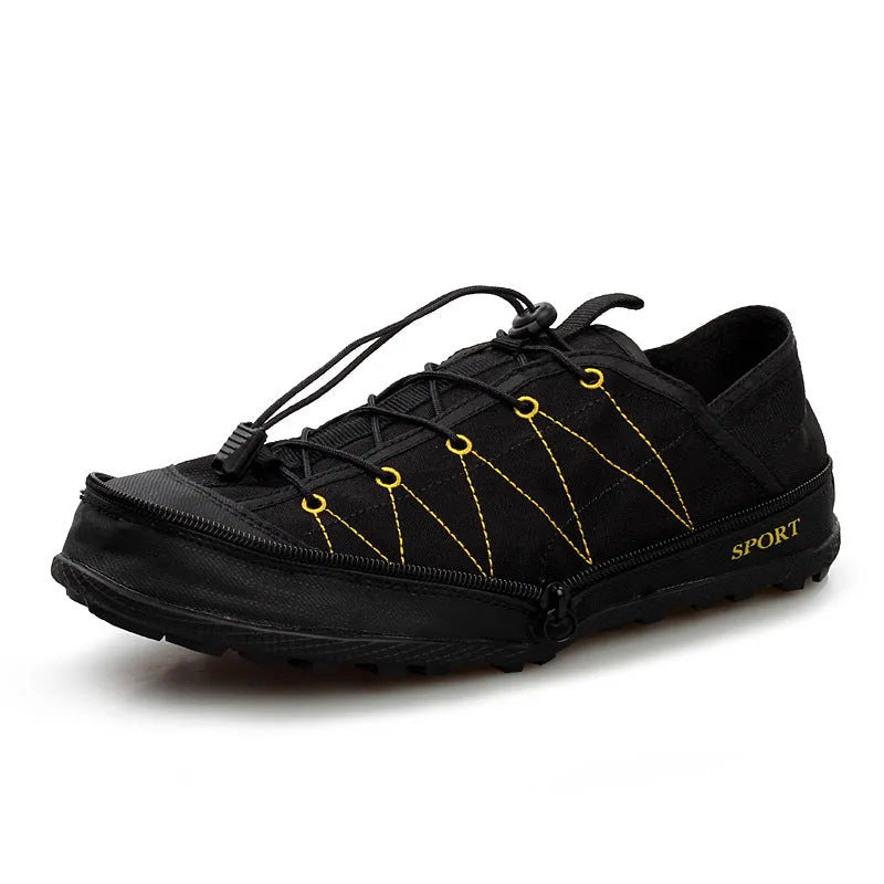 Orange, black, and grey folding outdoor hiking shoes with side zipper, shown in a compact, folded state.