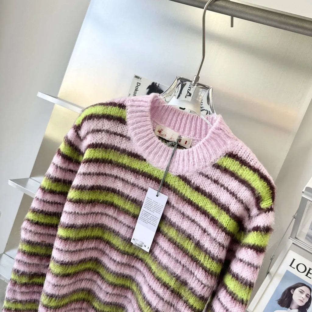 Pink women's wool knitted cardigan in socialite style with regular sleeves.