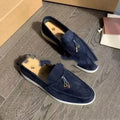 Casual slip-on Gommino loafers in black with round toe, rubber sole, and high-top design.