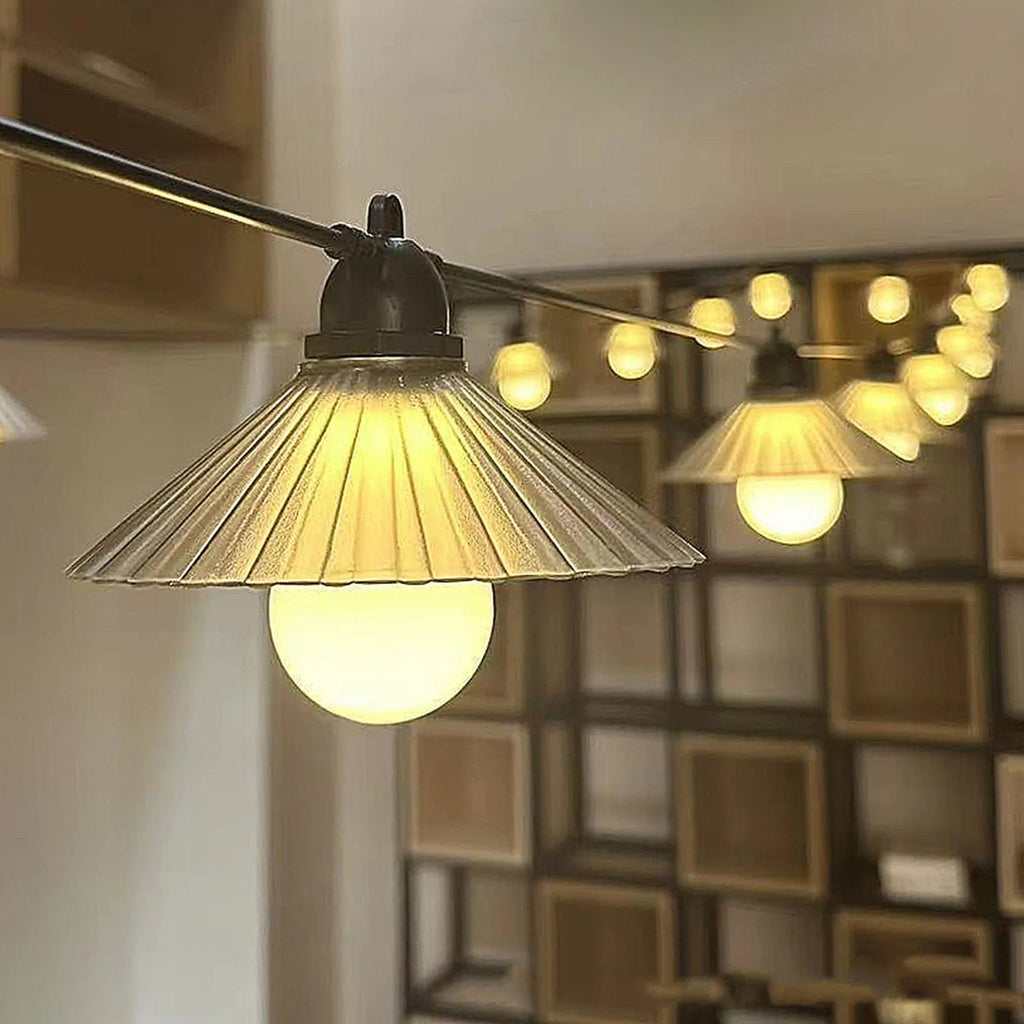 Outdoor LED string lights with flower-shaped coloured globes for garden patio decoration