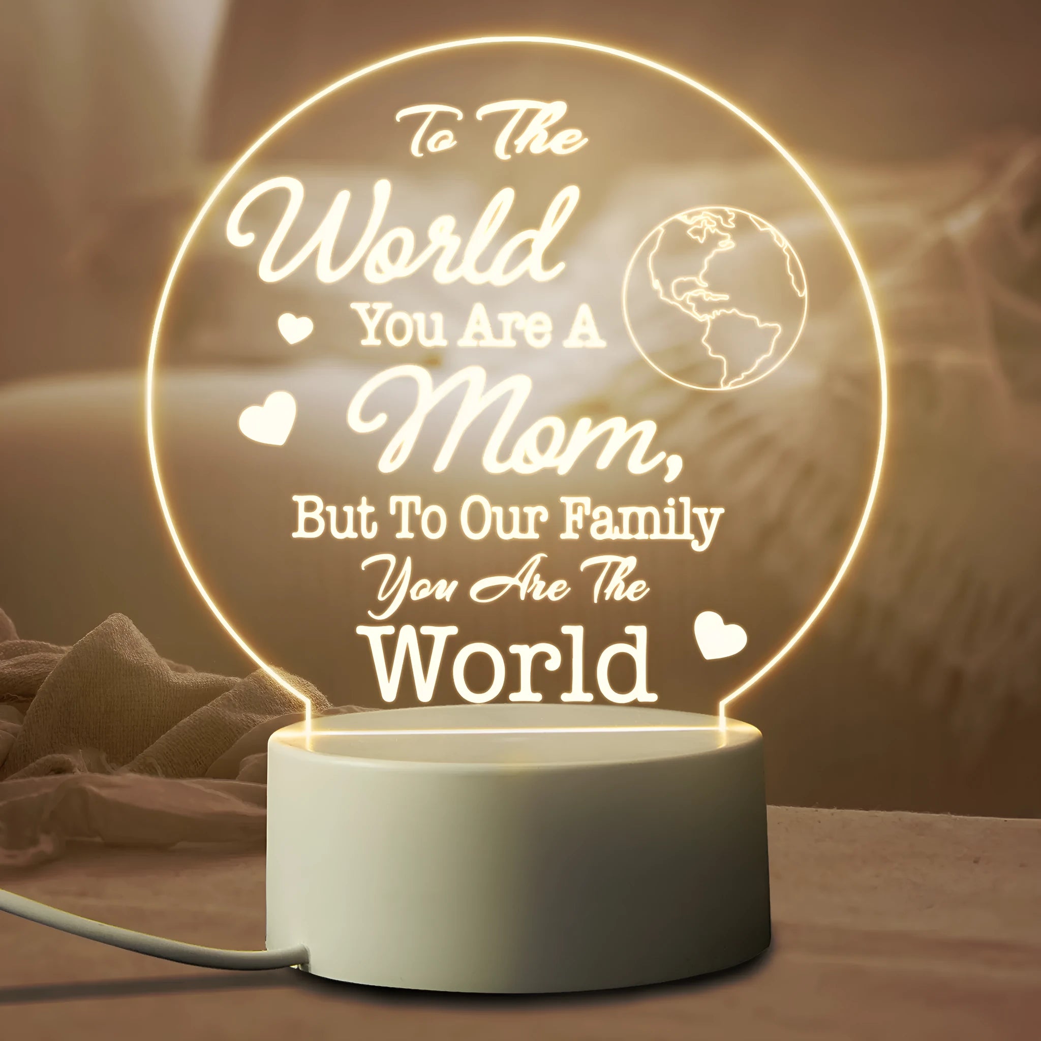 Modern minimalist LED night light with acrylic shade on a white ABS base, powered by a USB cable.