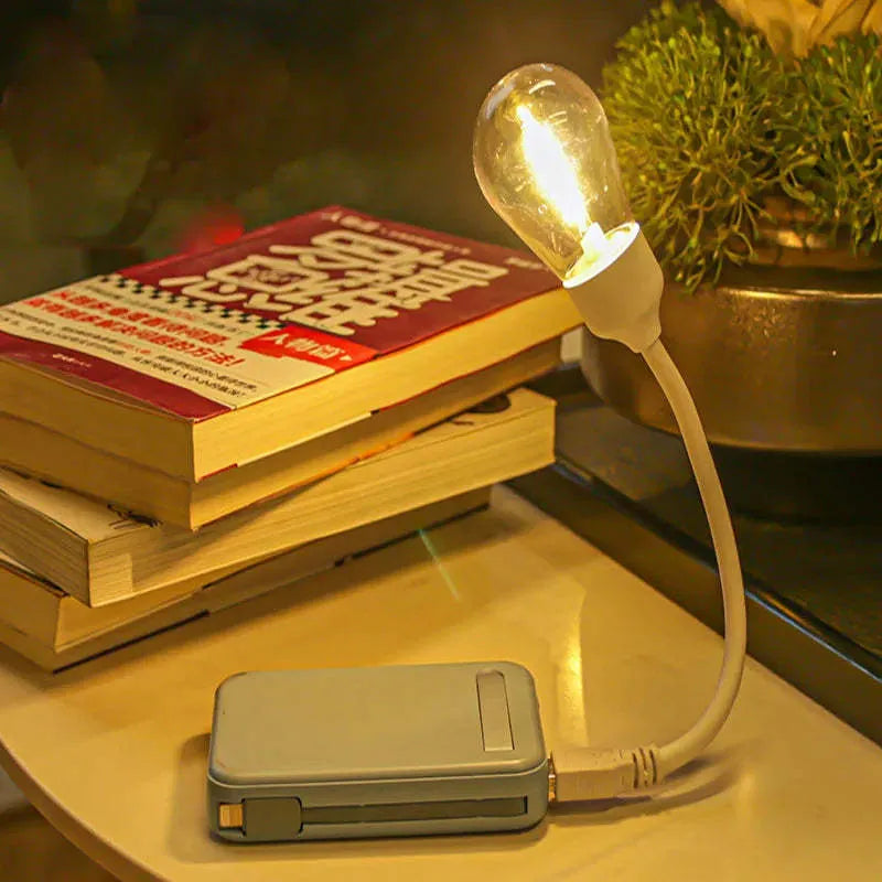 USB rechargeable folding tungsten night light showing compact storage design