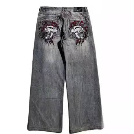 Men's grey washed-out wide-leg jeans with a straight cut and mid-rise waist on a mannequin.
